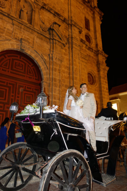 Dreamy wedding setup in historic Cartagena. Bride and Groom in a carriage