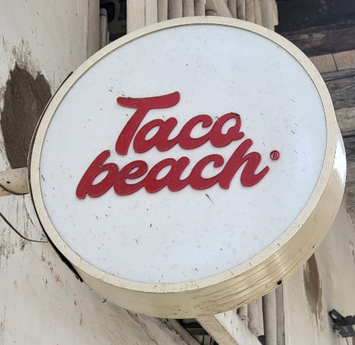 TacoBeach is an Affordable and Trendy Restaurants in Cartagena. The vibrant TacoBeach sign displayed above the entrance door, inviting guests to enjoy Mexican-inspired cuisine in Cartagena.